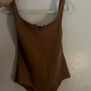 Brown body suit